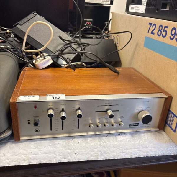 Vintage Alpha FA-400 stereo amplifier with woodgrain finish.