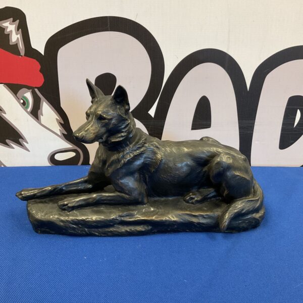 Vintage bronzed iron Alsatian dog sculpture, detailed animal figurine.