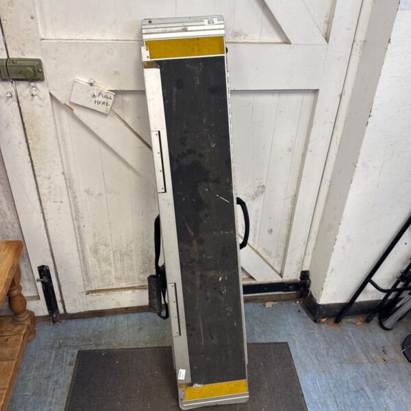 Silver aluminium folding wheelchair ramp for accessibility.