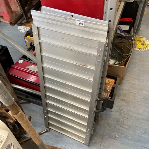 Portable aluminum folding wheelchair ramp for accessibility solutions.