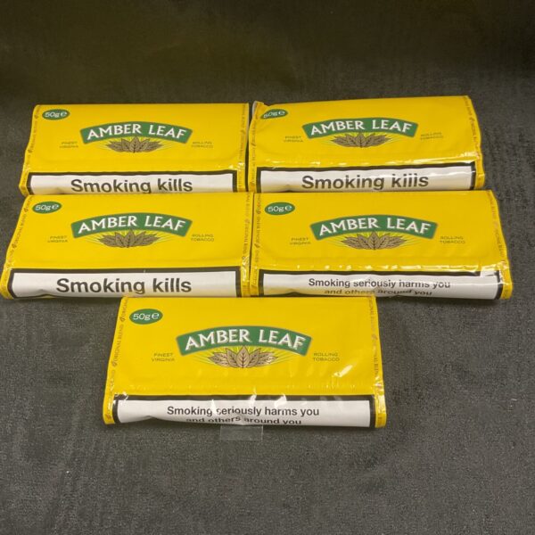 Five packs of Amber Leaf rolling tobacco.