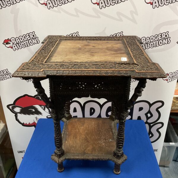 Antique Anglo Indian lamp table with detailed carving.