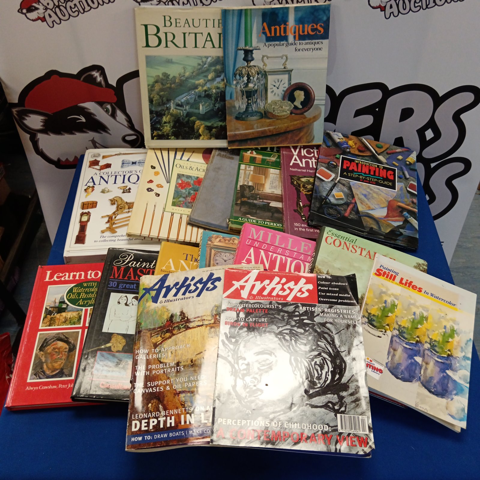 Bundle of antique art books and collecting guides.
