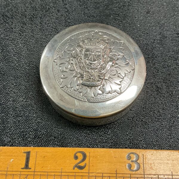 Antique continental silver snuff box with embossed maritime armorial lid design