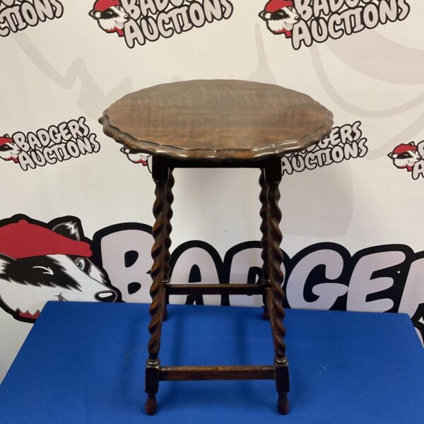 Antique oak side table with barley twist legs and scallop edge.