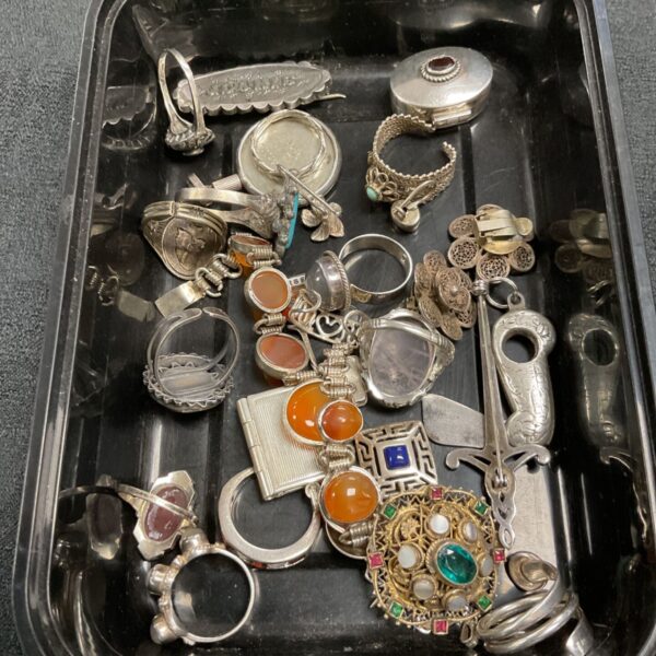 Antique silver collection featuring Victorian brooch, rings and pillbox.