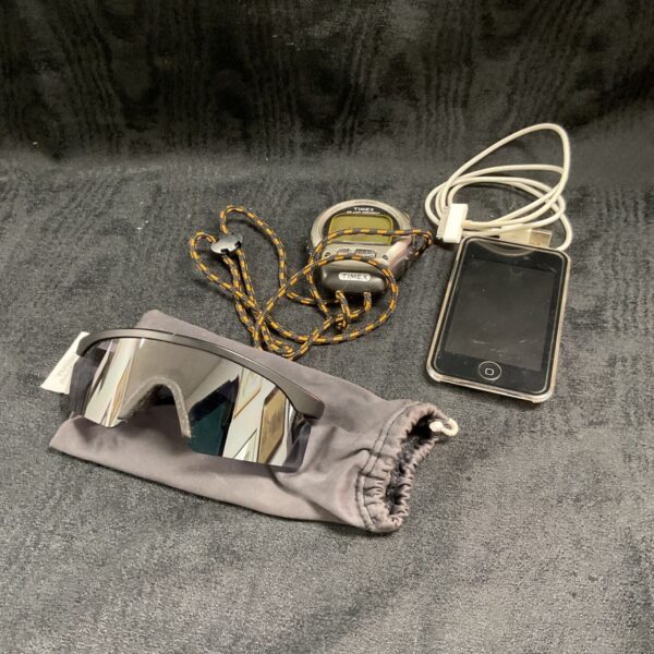 Apple iPod, Timex stopwatch, and Oakley sunglasses bundle for sale.