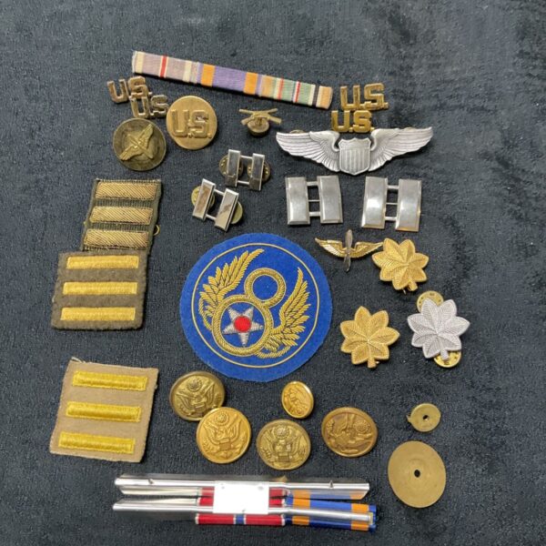 US Army Air Force insignia lot with badges, pins, and buttons.