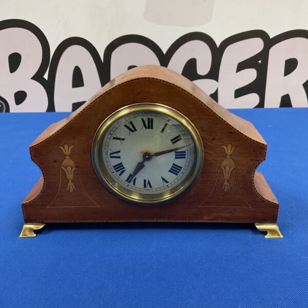 Front view of Art Nouveau Scottish mantel clock with inlaid wooden case