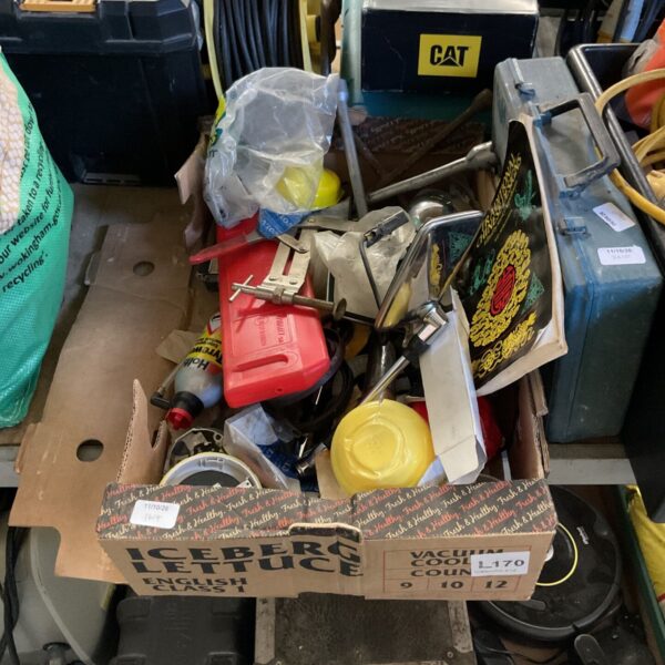 Assorted tool lot with vintage hand tools and a Chinese design book.