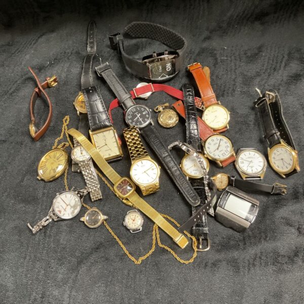 Assorted vintage wristwatches presented as a lot for collectors.