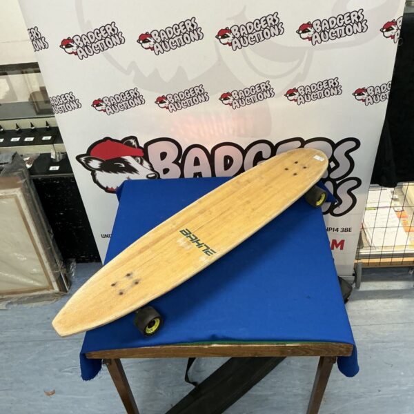 Vintage Bahne skateboard with red and white graphic.