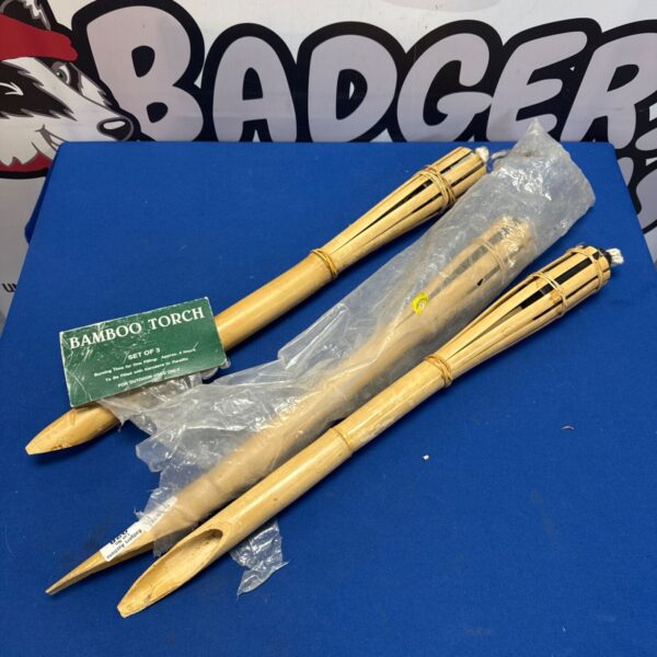 Lot of three bamboo garden torches for outdoor use.
