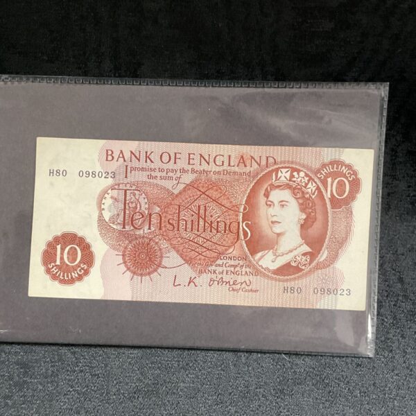 Vintage Bank of England ten shilling note with Queen Elizabeth II portrait.