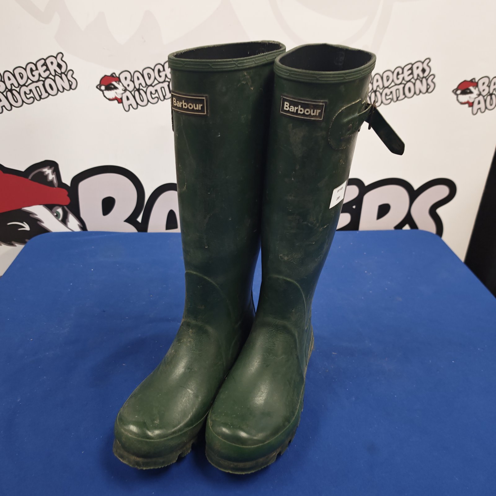 Pair of dark green Barbour wellington boots with adjustable buckle strap