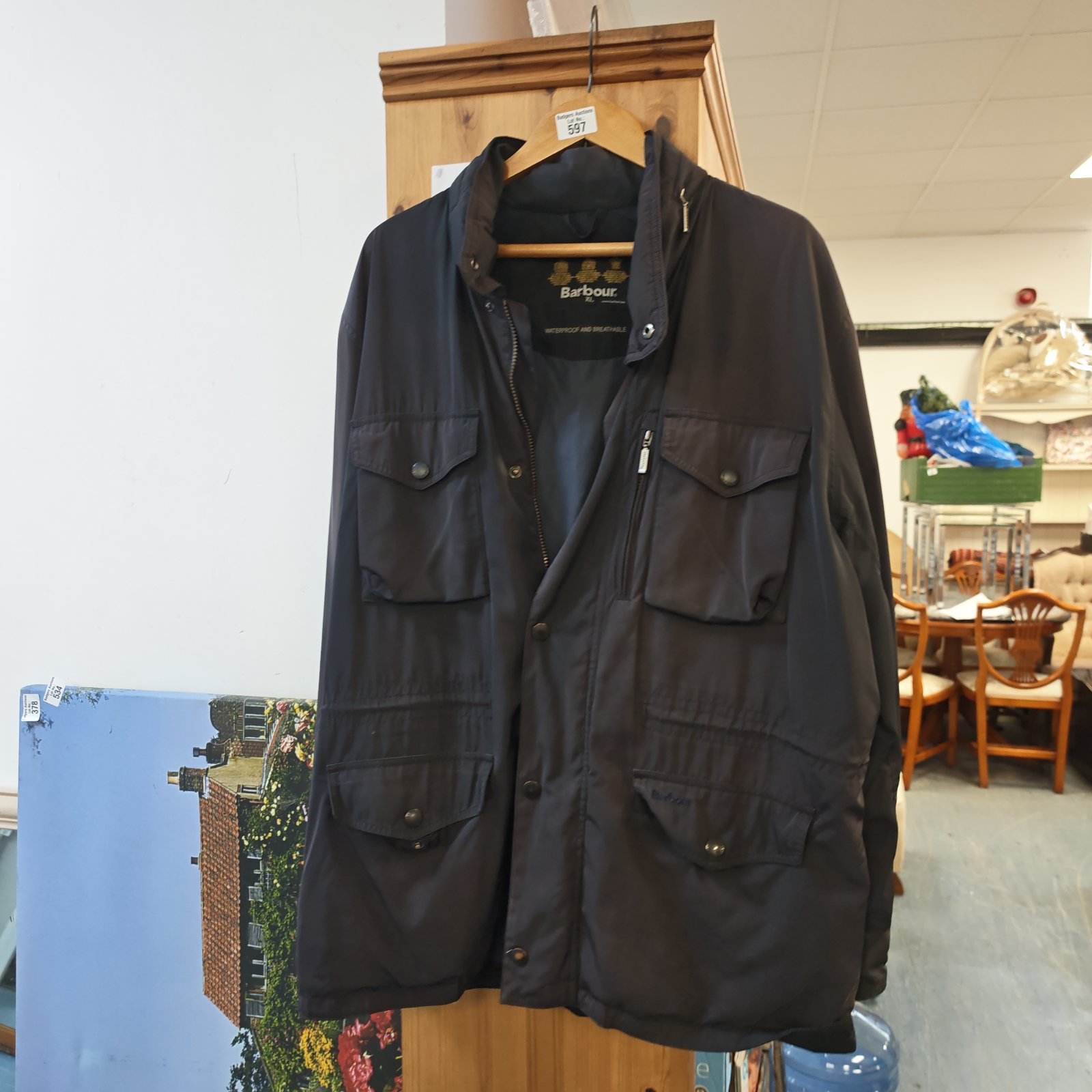 Barbour XL waterproof coat, a durable piece of outdoor clothing.