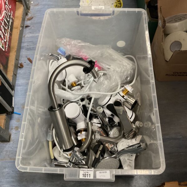 Mixed lot of bathroom appliances including shower heads and taps.