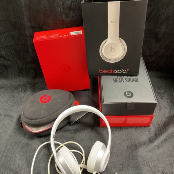 White Beats Solo 2 headphones with original packaging.