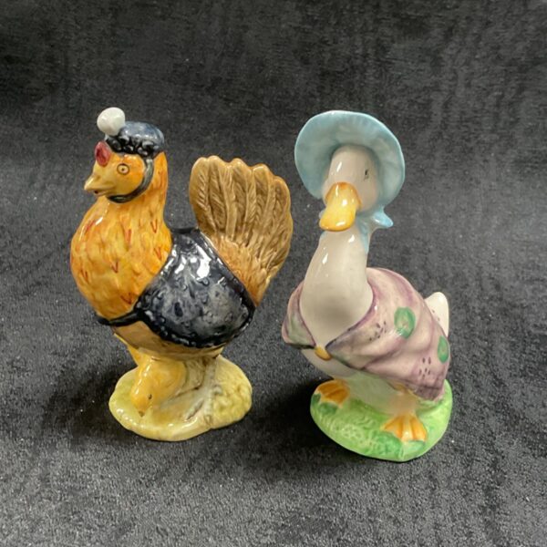 Vintage Beswick Beatrix Potter Jemmima Puddleduck and Sally Henny Penny figures.