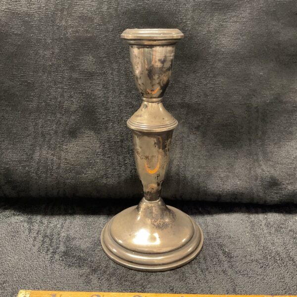 Vintage Birks sterling silver candlestick with ruler for scale.
