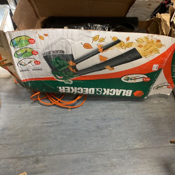 Used Black and Decker leaf blower BW200 for garden cleanup.