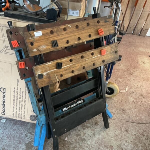 Black and Decker Workmate 600 folding workbench with timber battens and orange clamps