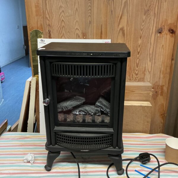 Black wood burner style electric heater with faux logs and glazed front