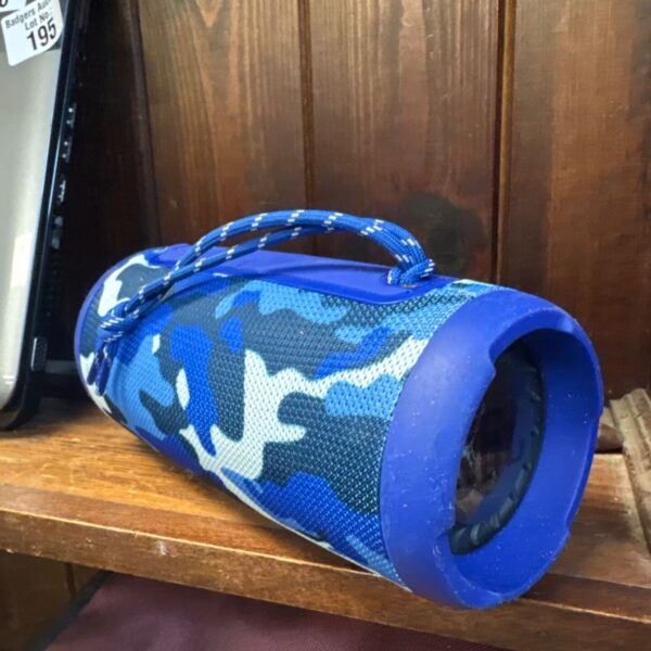 Blue camouflage Bluetooth speaker with braided carry handle and rubber end caps