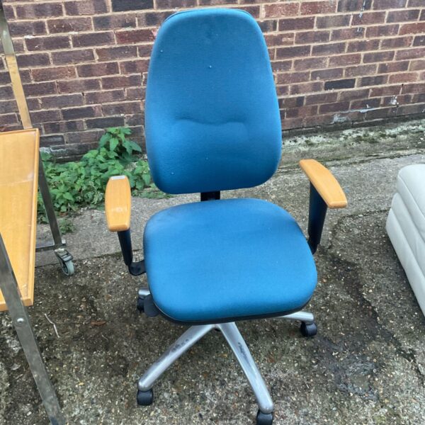 Blue upholstered swivel office chair with wooden armrests and silver five-star base