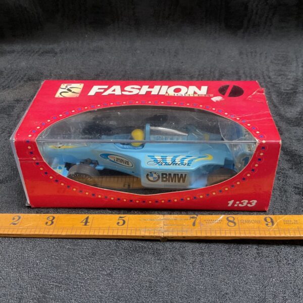 Detailed 1:33 scale BMW F1 cigarette lighter replica.