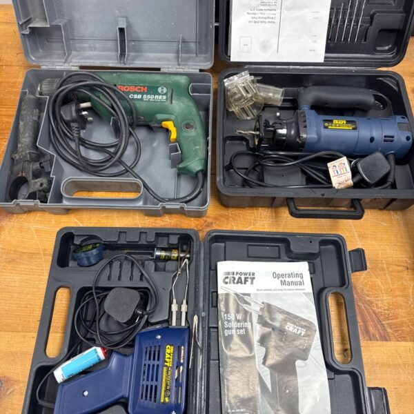 Bosch corded drill set with Powercraft omnisaw and soldering iron.
