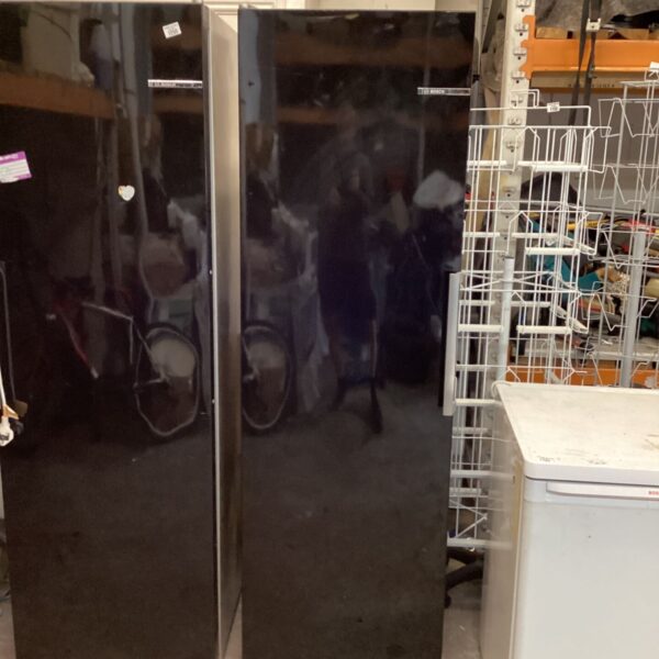 Black Bosch full length fridge with glossy door and side handle