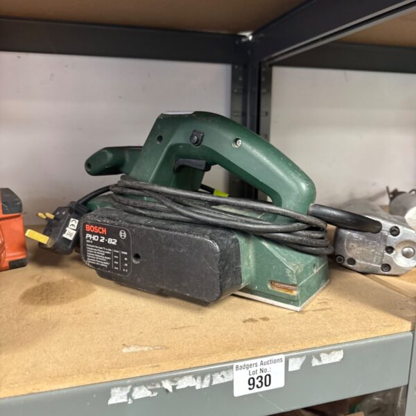 Vintage Bosch PHO 2-82 electric planer for woodworking.