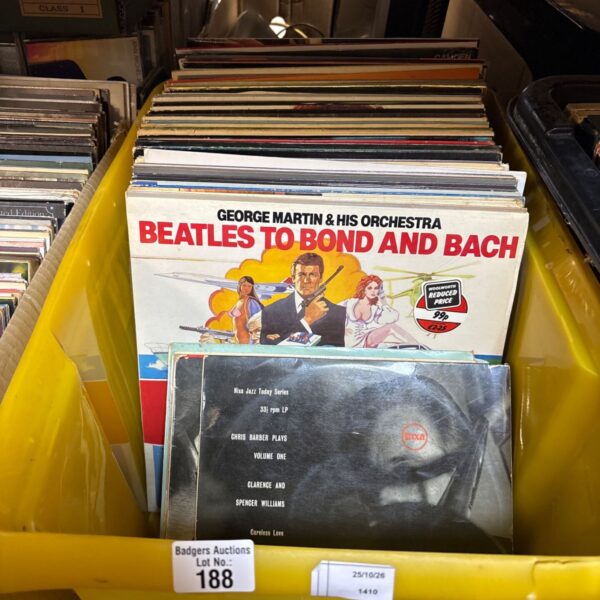 Yellow crate of mixed 12 inch vinyl records including Beatles to Bond and Bach