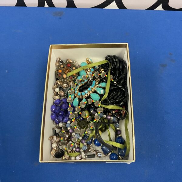 Box of mixed costume jewellery with stone brooch and bead necklaces