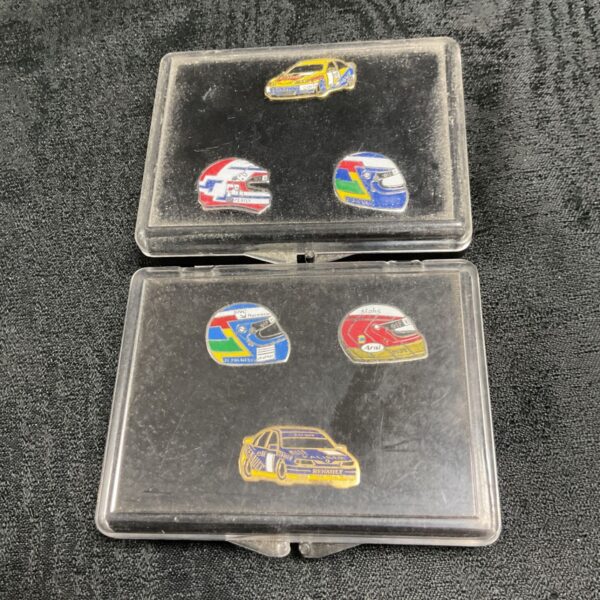 British Touring Car Championship pin badges featuring helmet designs.