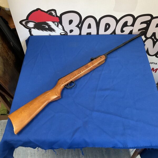 Vintage BSA Meteor .22 air rifle with wooden stock.