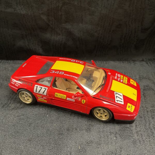 Red Burago Ferrari 348 1/18 scale diecast model car with race number 177