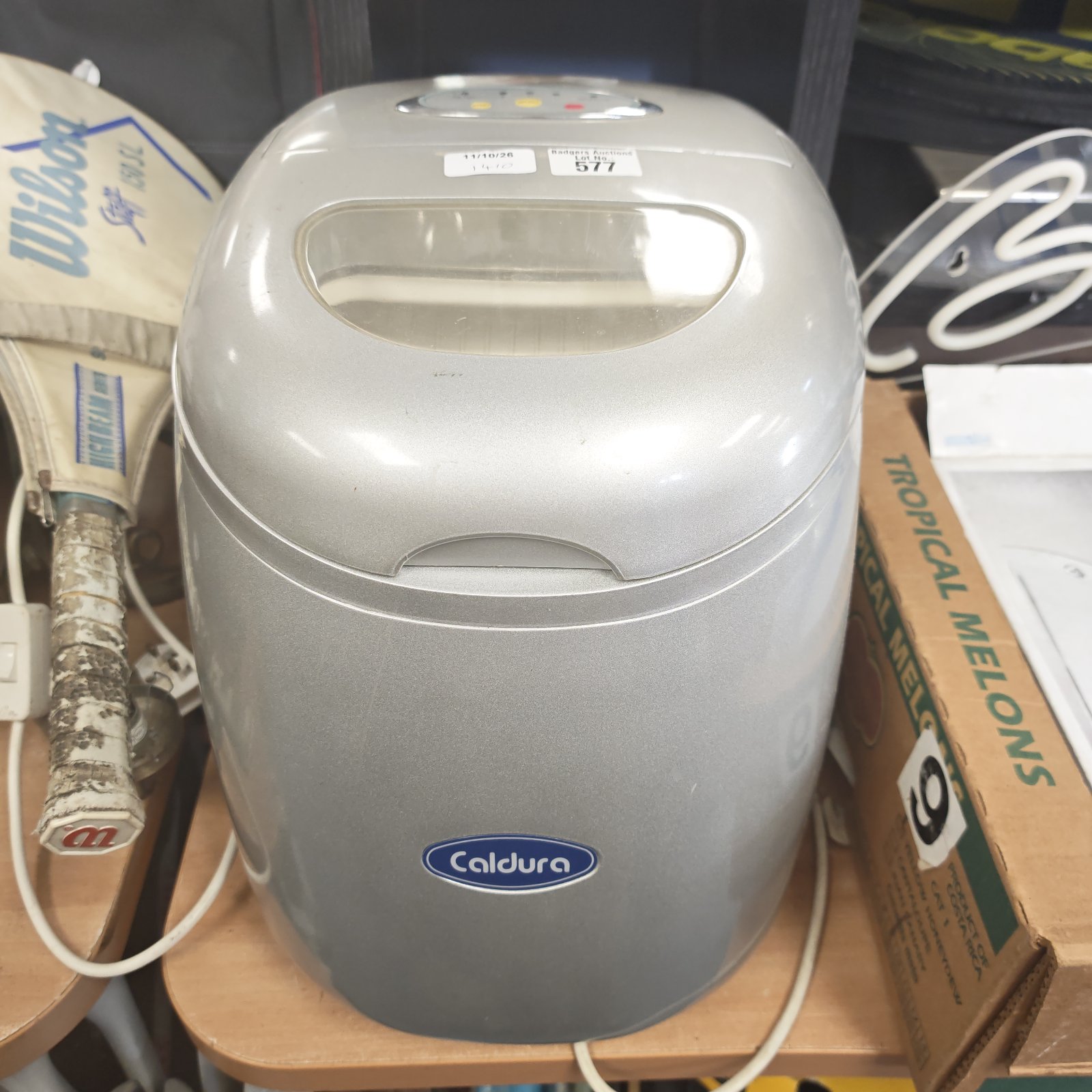 Grey Caldura ice machine model 81126, countertop appliance.