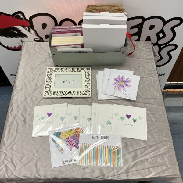 Greeting cards and Mr and Mrs photo frame in grey-green tray, auction lot
