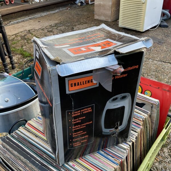 Original box for Challenge ceramic oscillating tower heater, worn and taped