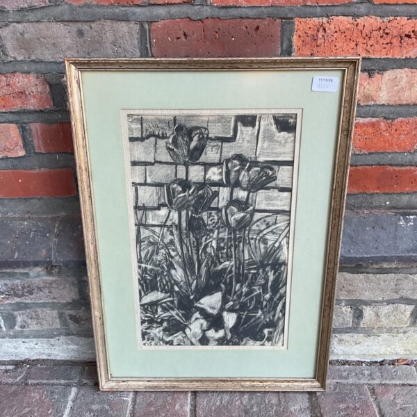 Original charcoal flower still life drawing against brick wall.