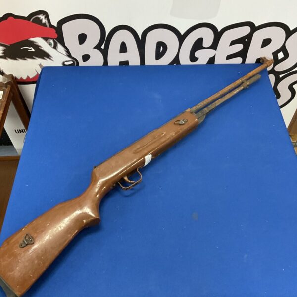 Vintage Chinese air rifle needing restoration, classic airgun.
