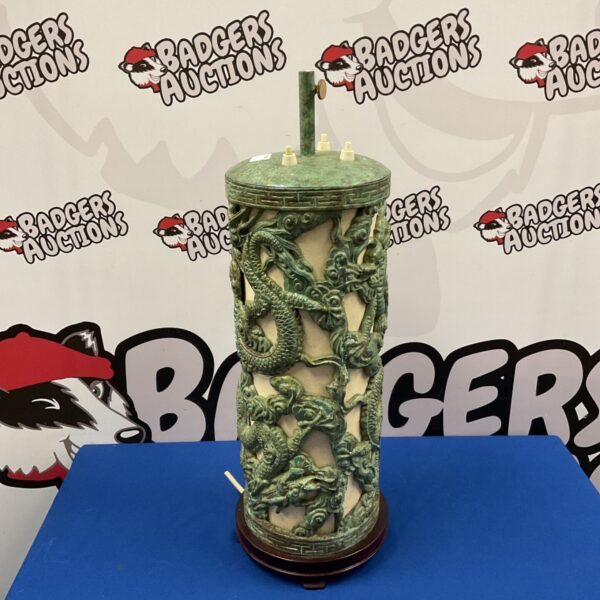 Vintage Chinese table lamp with green dragon relief.