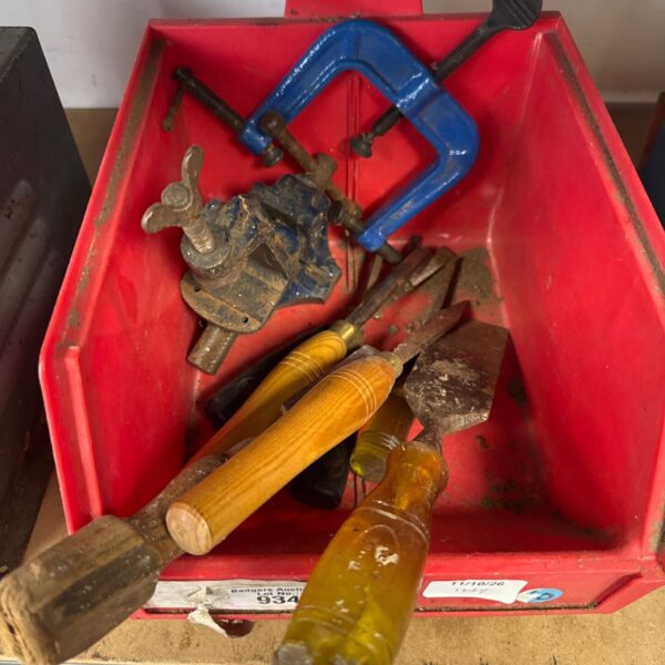 Vintage chisels and clamps lot for woodworking and DIY projects.