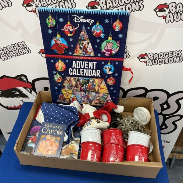 Christmas decorations bundle featuring a Disney advent calendar and carol books.