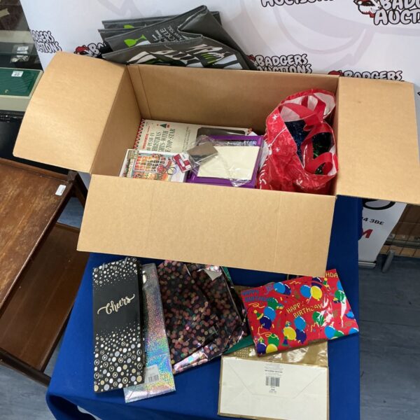 Mixed lot of Christmas decorations and gift bags for festive holidays.