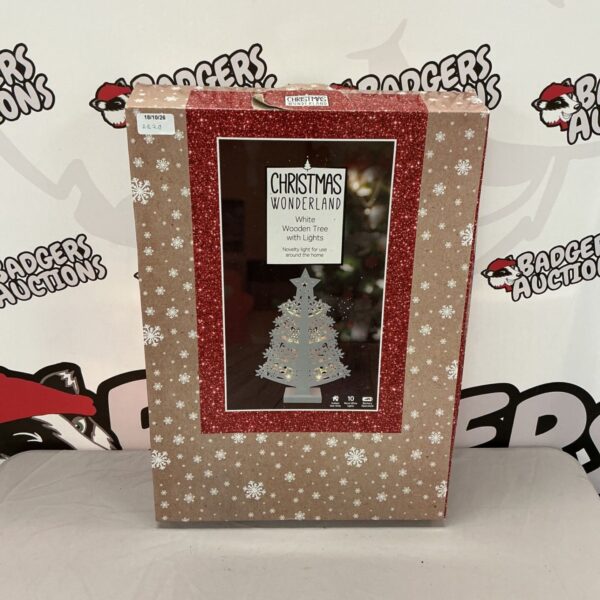 Christmas Wonderland white wooden tree with lights, festive decoration.