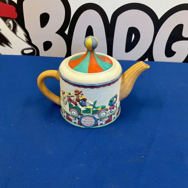 Vintage Christopher Wren Staffordshire teapot with colourful design.