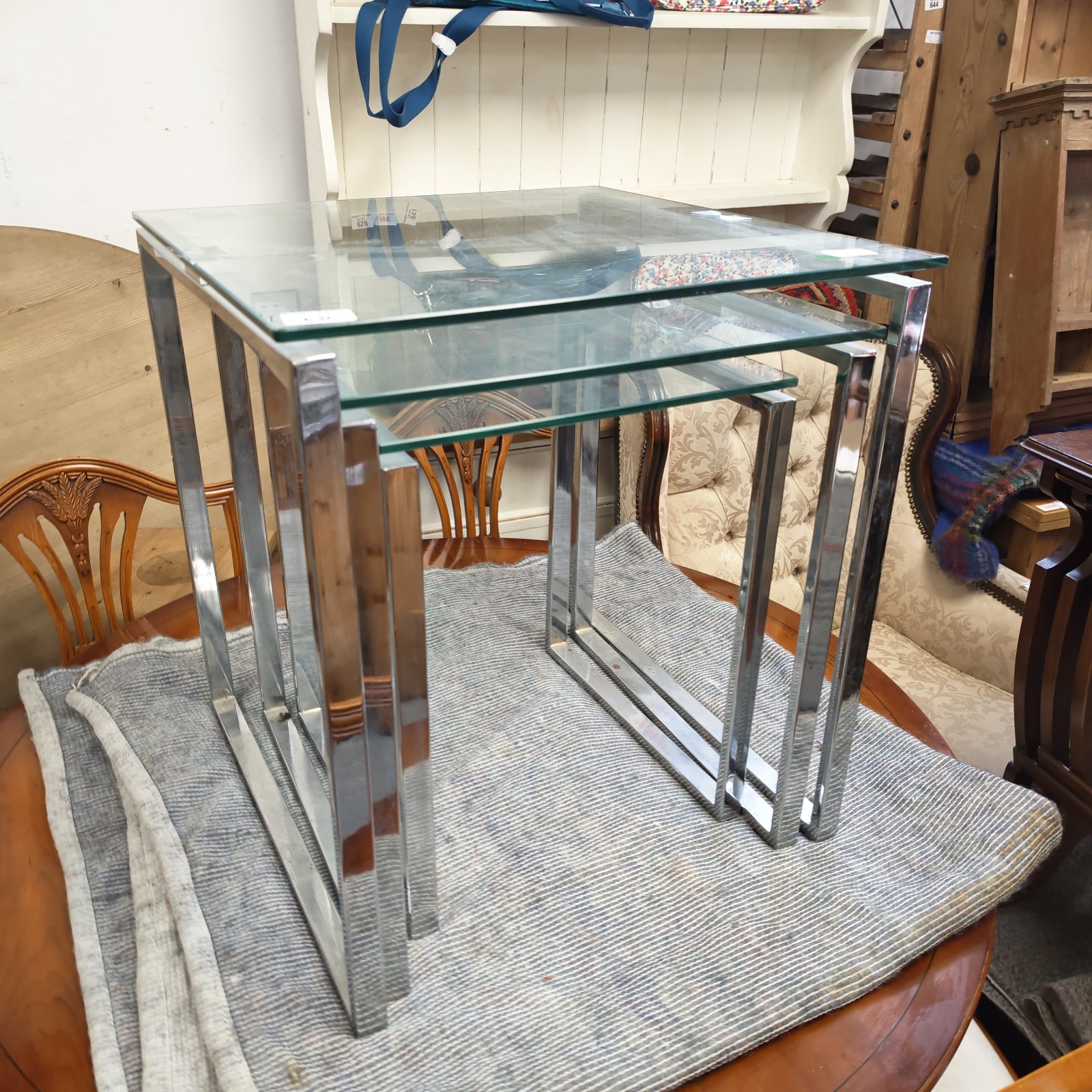 Vintage chrome and glass nest of tables in good condition.